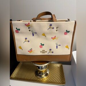 Coach purse

DEMPSEY CARRYALL WITH DREAMY VEGGIE PRINT
